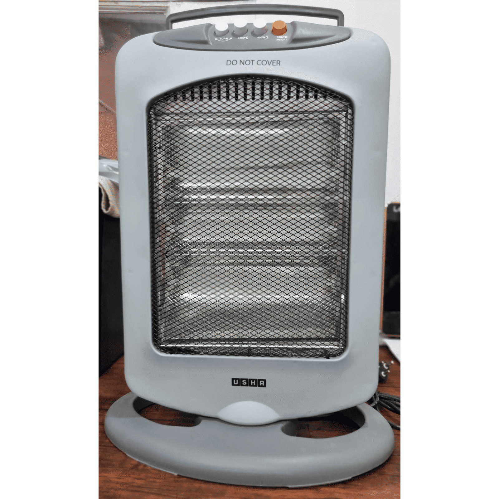 USHA HH 4003 1200W Halogen Room Heater with Automatic Oscillation (Safety Tip Over Protection USHA HH 4003 1200W Halogen Room Heater with Automatic Oscillation (Safety Tip Over Protection_4
